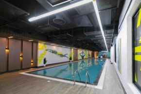 Modern 3BR Retreat I Gym, Balcony & Prime Location